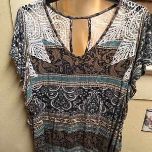 It’s top with lace accent